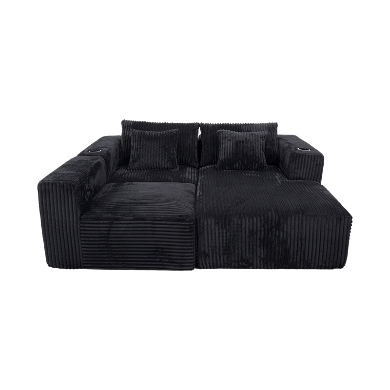 Sofa góc hình chữ L lớn bằng vải nhung màu đen với các mô-đun đầy bọt, nhiều đệm và giá đỡ cốc tích hợp