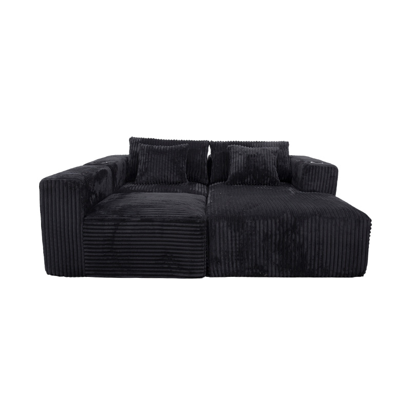 Sofa góc hình chữ L lớn bằng vải nhung màu đen với các mô-đun đầy bọt, nhiều đệm và giá đỡ cốc tích hợp